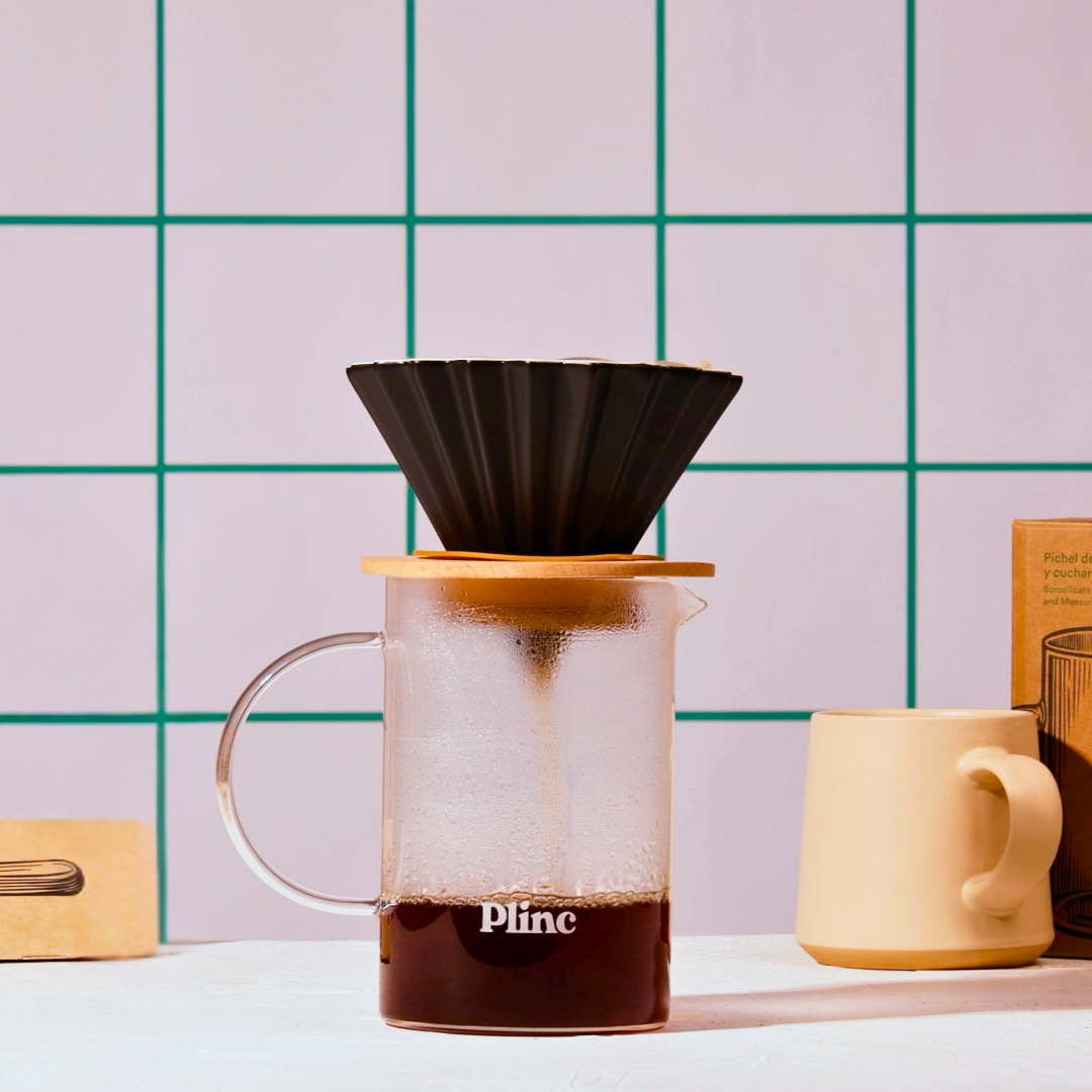 A Plinc carafe used to brew coffee with an Origami dripper.