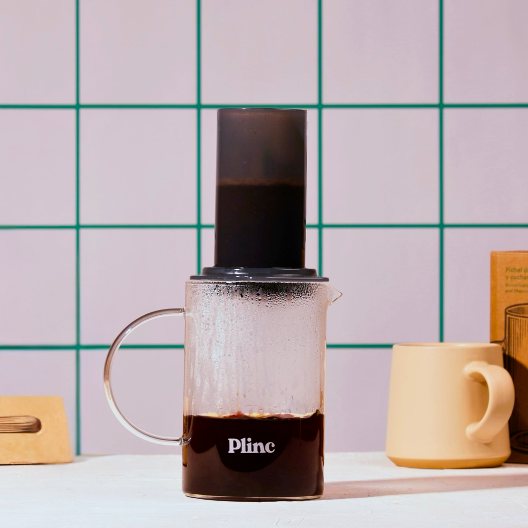 A Plinc carafe used to brew coffee with an AeroPress.