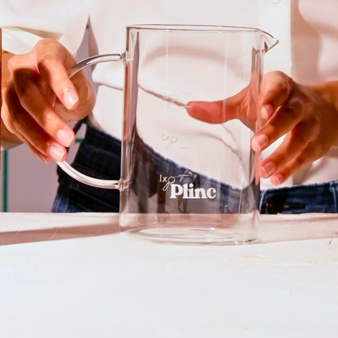 A Plinc glass carafe for brewing and serving coffee.