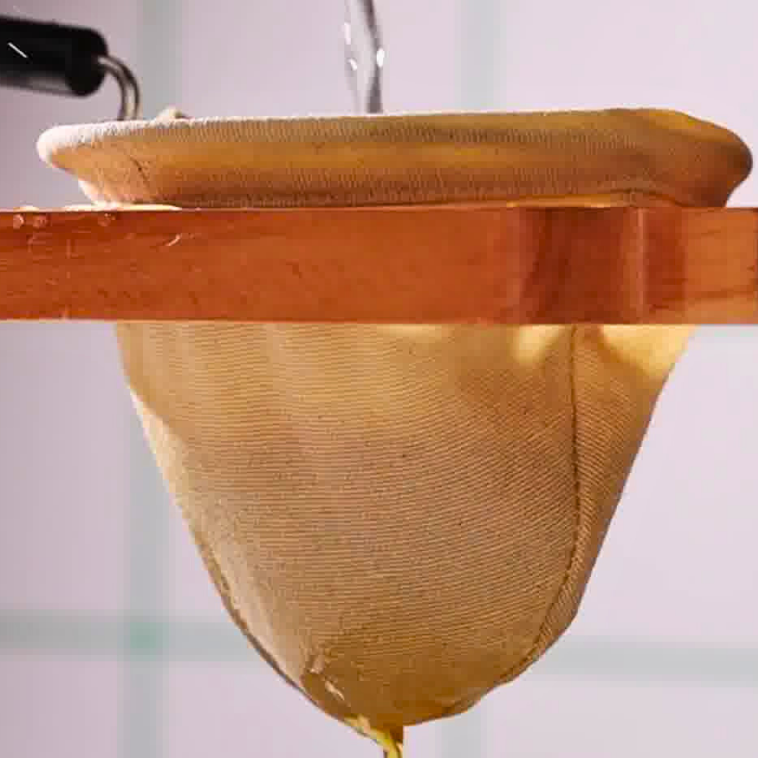 A Plinc cloth filter during coffee preparation.